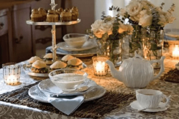 table assorted with cupcakes and tea