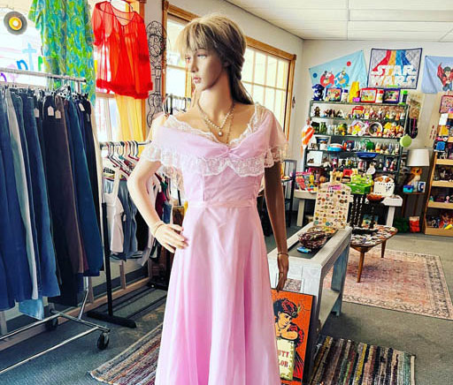 female mannequin dressed with pink dress