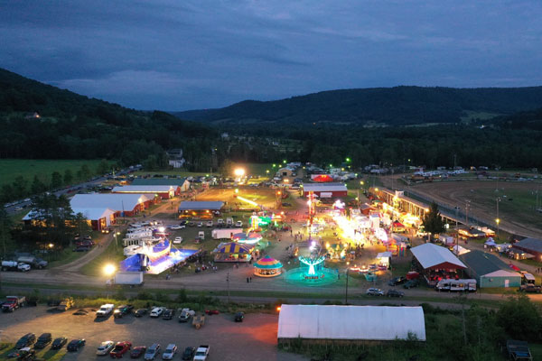 county fair at night with lights on
