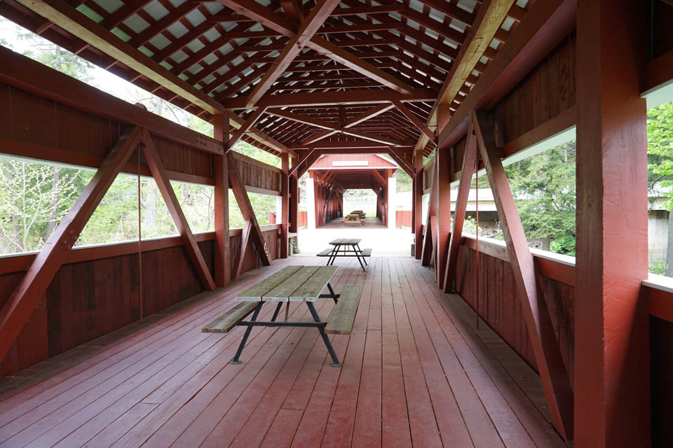 Picnic Tables under Covered Bridge