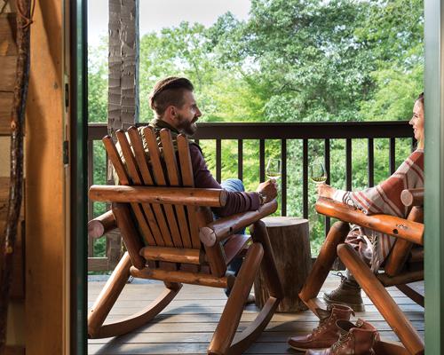 couple sitting on patio in Suite